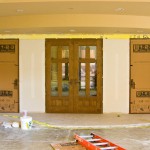 Installation of surface protection in a sanctuary hallway