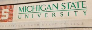 A stone sign for Michigan State University
