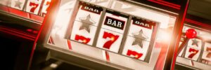 Slot Machines Spin 3D Render. Three One Handed Bandit Gambling Machines Conceptual Illustration.